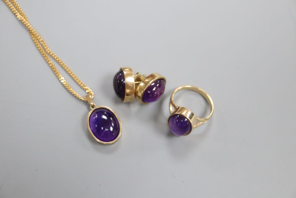 A 9ct gold cabochon amethyst ring, ear stud and pendant set, 24.1g gross
